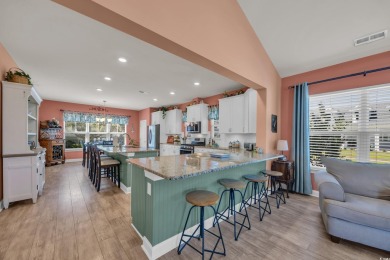 Relax on the welcoming front porch and soak up the sunshine in on Surf Golf and Beach Club in South Carolina - for sale on GolfHomes.com, golf home, golf lot