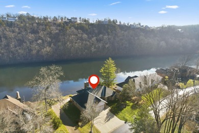 Now on the market for the very first time, this stunning Lake on Pointe Royale Village Country Club in Missouri - for sale on GolfHomes.com, golf home, golf lot