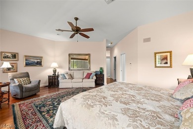 This custom contemporary classic is a truly remarkable offering on Fiddlesticks Country Club in Florida - for sale on GolfHomes.com, golf home, golf lot