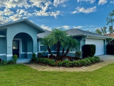 This single-family home is situated in the desirable Cypress on The Grand Club Cypress Course in Florida - for sale on GolfHomes.com, golf home, golf lot