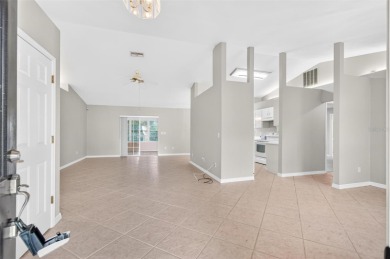 This single-family home is situated in the desirable Cypress on The Grand Club Cypress Course in Florida - for sale on GolfHomes.com, golf home, golf lot