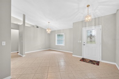 This single-family home is situated in the desirable Cypress on The Grand Club Cypress Course in Florida - for sale on GolfHomes.com, golf home, golf lot
