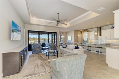 Fall in love with this 2015 built custom waterfront pool home on Saint Andrews South Golf Club in Florida - for sale on GolfHomes.com, golf home, golf lot