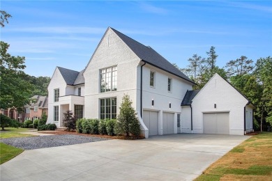Set on a sprawling 1-acre lot in an established, tree-lined on Dunwoody Country Club in Georgia - for sale on GolfHomes.com, golf home, golf lot