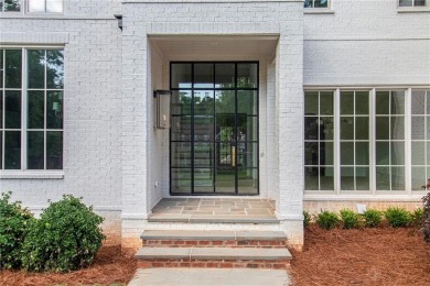 Set on a sprawling 1-acre lot in an established, tree-lined on Dunwoody Country Club in Georgia - for sale on GolfHomes.com, golf home, golf lot
