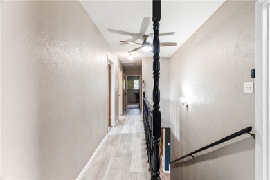 Located in the heart of Corpus Christi, this spacious two-story on Corpus Christi Country Club Golf Course in Texas - for sale on GolfHomes.com, golf home, golf lot