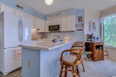 Experience the best of coastal living in this furnished on Possum Trot Golf Course in South Carolina - for sale on GolfHomes.com, golf home, golf lot
