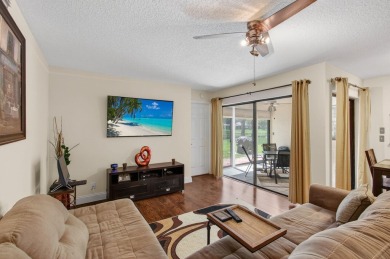 Rarely available 1st floor corner unit with serene lake views on Aberdeen Golf and Country Club in Florida - for sale on GolfHomes.com, golf home, golf lot