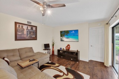 Rarely available 1st floor corner unit with serene lake views on Aberdeen Golf and Country Club in Florida - for sale on GolfHomes.com, golf home, golf lot