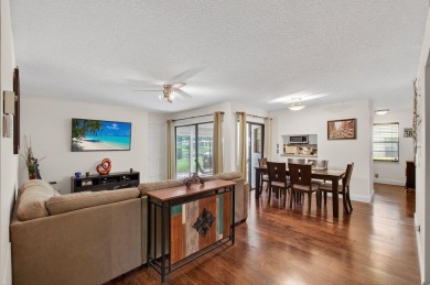 Rarely available 1st floor corner unit with serene lake views on Aberdeen Golf and Country Club in Florida - for sale on GolfHomes.com, golf home, golf lot