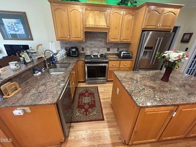 This beautifully crafted 3 bedroom, 2 1/2-bath home blends on  in North Carolina - for sale on GolfHomes.com, golf home, golf lot