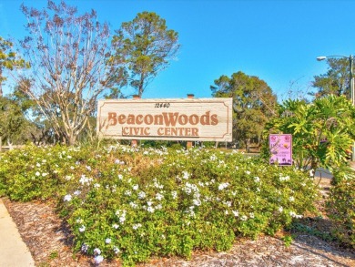 Under contract-accepting backup offers. Welcome home to this low on Beacon Woods Golf Club in Florida - for sale on GolfHomes.com, golf home, golf lot