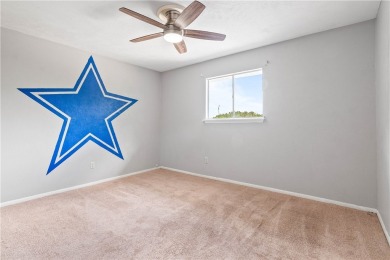 Located in the heart of Corpus Christi, this spacious two-story on Corpus Christi Country Club Golf Course in Texas - for sale on GolfHomes.com, golf home, golf lot