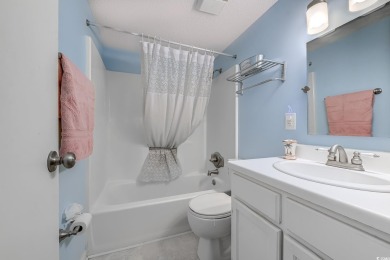 Experience the best of coastal living in this furnished on Possum Trot Golf Course in South Carolina - for sale on GolfHomes.com, golf home, golf lot