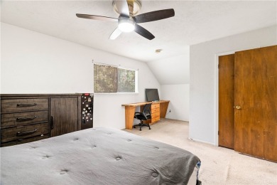 Located in the heart of Corpus Christi, this spacious two-story on Corpus Christi Country Club Golf Course in Texas - for sale on GolfHomes.com, golf home, golf lot