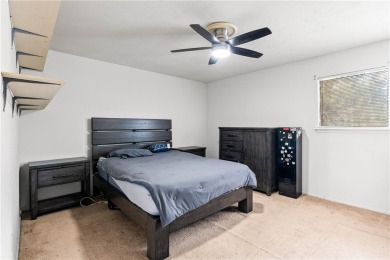 Located in the heart of Corpus Christi, this spacious two-story on Corpus Christi Country Club Golf Course in Texas - for sale on GolfHomes.com, golf home, golf lot