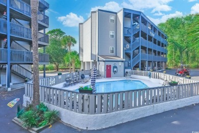 Experience the best of coastal living in this furnished on Possum Trot Golf Course in South Carolina - for sale on GolfHomes.com, golf home, golf lot
