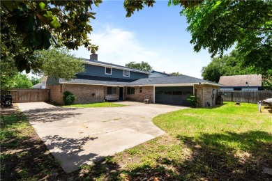Located in the heart of Corpus Christi, this spacious two-story on Corpus Christi Country Club Golf Course in Texas - for sale on GolfHomes.com, golf home, golf lot