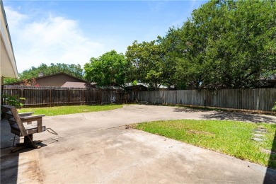Located in the heart of Corpus Christi, this spacious two-story on Corpus Christi Country Club Golf Course in Texas - for sale on GolfHomes.com, golf home, golf lot