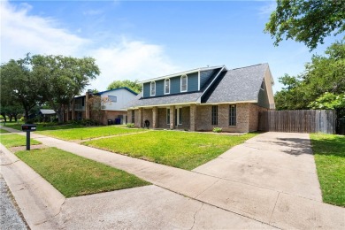 Located in the heart of Corpus Christi, this spacious two-story on Corpus Christi Country Club Golf Course in Texas - for sale on GolfHomes.com, golf home, golf lot