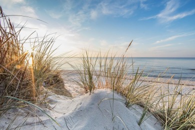 Experience the best of coastal living in this furnished on Possum Trot Golf Course in South Carolina - for sale on GolfHomes.com, golf home, golf lot