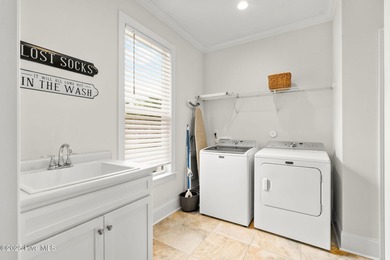 Built by the award-winning Horizon Homes of Wilmington, this on Compass Pointe Golf Course in North Carolina - for sale on GolfHomes.com, golf home, golf lot