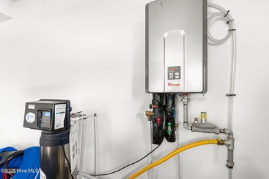 Built by the award-winning Horizon Homes of Wilmington, this on Compass Pointe Golf Course in North Carolina - for sale on GolfHomes.com, golf home, golf lot