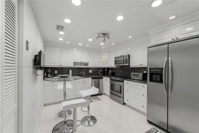 Stunning and renovated corner residence with breathtaking views on Bonaventure Country Club in Florida - for sale on GolfHomes.com, golf home, golf lot