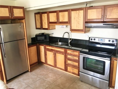 Studio condo in a prime location with an absolutely stunning on Makaha Valley Country Club in Hawaii - for sale on GolfHomes.com, golf home, golf lot