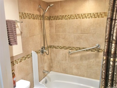 Studio condo in a prime location with an absolutely stunning on Makaha Valley Country Club in Hawaii - for sale on GolfHomes.com, golf home, golf lot