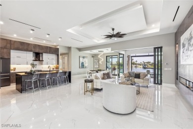 Stunning New Construction Home on Gulf-Access Canal with Canal on Royal Tee Country Club in Florida - for sale on GolfHomes.com, golf home, golf lot