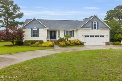Charming waterview retreat! Welcome to 901 Caracara Drive a on Harbour Point Golf Club in North Carolina - for sale on GolfHomes.com, golf home, golf lot