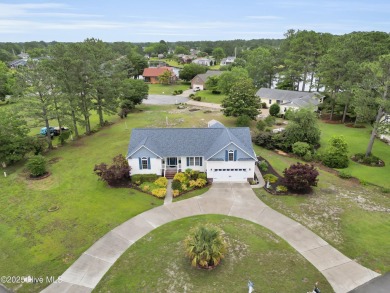 Charming waterview retreat! Welcome to 901 Caracara Drive a on Harbour Point Golf Club in North Carolina - for sale on GolfHomes.com, golf home, golf lot