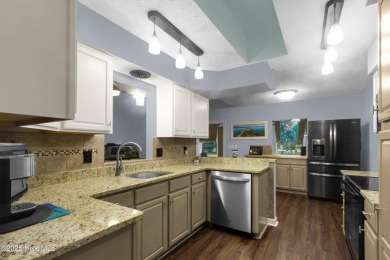 Charming waterview retreat! Welcome to 901 Caracara Drive a on Harbour Point Golf Club in North Carolina - for sale on GolfHomes.com, golf home, golf lot