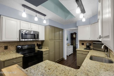 Charming waterview retreat! Welcome to 901 Caracara Drive a on Harbour Point Golf Club in North Carolina - for sale on GolfHomes.com, golf home, golf lot