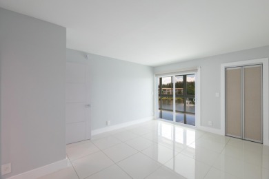 Serenity with sophisticated upgrades and timeless elegance, this on Wynmoor Golf Course in Florida - for sale on GolfHomes.com, golf home, golf lot