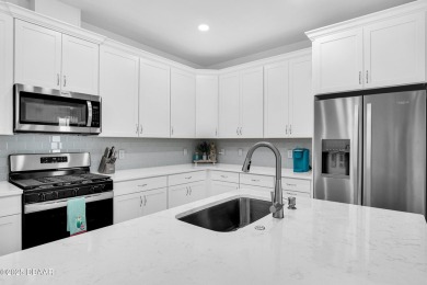 Embrace paradise in this like new Lucia Villa & start living on LPGA International Golf Course in Florida - for sale on GolfHomes.com, golf home, golf lot