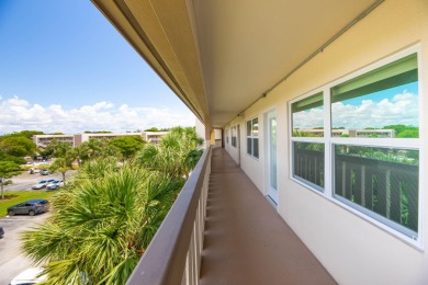 Serenity with sophisticated upgrades and timeless elegance, this on Wynmoor Golf Course in Florida - for sale on GolfHomes.com, golf home, golf lot