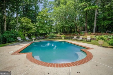 Welcome to this gorgeous three-sided brick European style ranch on Brookfield Country Club in Georgia - for sale on GolfHomes.com, golf home, golf lot