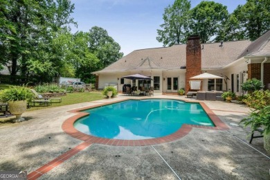 Welcome to this gorgeous three-sided brick European style ranch on Brookfield Country Club in Georgia - for sale on GolfHomes.com, golf home, golf lot