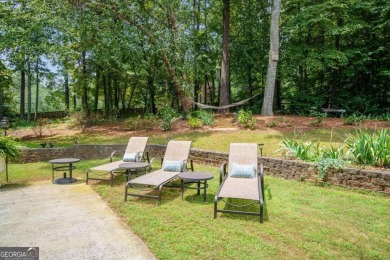 Welcome to this gorgeous three-sided brick European style ranch on Brookfield Country Club in Georgia - for sale on GolfHomes.com, golf home, golf lot