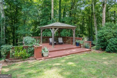 Welcome to this gorgeous three-sided brick European style ranch on Brookfield Country Club in Georgia - for sale on GolfHomes.com, golf home, golf lot