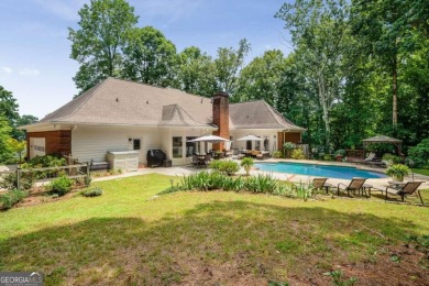 Welcome to this gorgeous three-sided brick European style ranch on Brookfield Country Club in Georgia - for sale on GolfHomes.com, golf home, golf lot