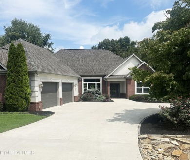 Nestled in the highly sought-after Tommotley Coves neighborhood on Tanasi Golf Course in Tennessee - for sale on GolfHomes.com, golf home, golf lot