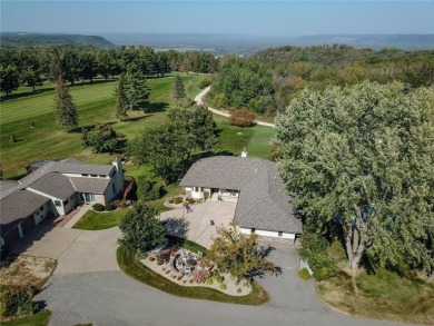 Nestled on a private .69-acre lot along the 2nd and 3rd holes of on Coffee Mill Golf and Country Club in Minnesota - for sale on GolfHomes.com, golf home, golf lot