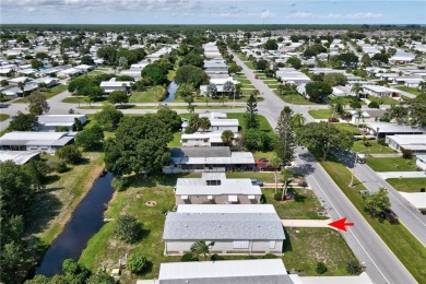 Barefoot Bay Resort Living on a BEER BUDGET..this 2005, 1490 sq on Barefoot Bay Golf Course in Florida - for sale on GolfHomes.com, golf home, golf lot