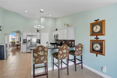Welcome HOME to this Gulf access pool home that lives large in on Burnt Store Golf Club in Florida - for sale on GolfHomes.com, golf home, golf lot
