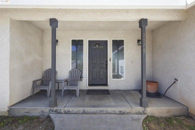 Charming 3-Bed, 2-Bath Home with Stunning Views  Lake Tulloch on The Club at Copper Valley Golf Course in California - for sale on GolfHomes.com, golf home, golf lot