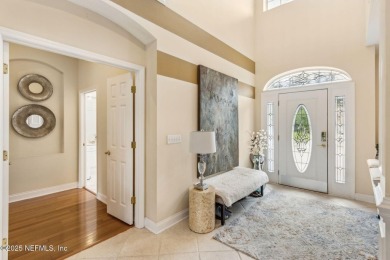 Welcome to this beautiful home located in the prestigious, gated on Country Club of Orange Park in Florida - for sale on GolfHomes.com, golf home, golf lot