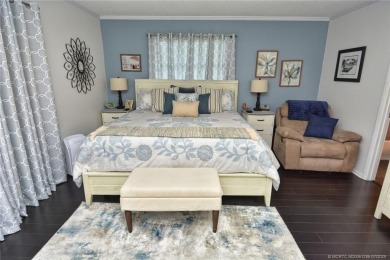 Updated dark floors add drama to the decor in this one bedroom 1 on Pine Lakes Golf Club in Florida - for sale on GolfHomes.com, golf home, golf lot